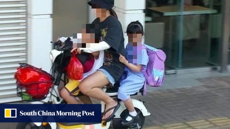 Polisi Hong Kong menangkap wanita yang ditampilkan dalam foto online mengendarai e-bike dengan 2 anak di trotoar di New Territories