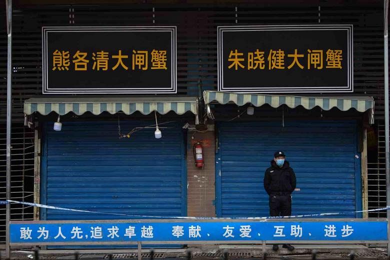 Penasihat Hong Kong tentang virus corona menarik kolom tentang ‘virus China’, meminta maaf atas kata-kata